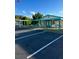 Community building with ample parking at 239 Rue De Fontaine, Tavares, FL 32778