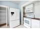 Well-equipped kitchen featuring modern appliances and a pantry for ample storage at 263 Ne 1St St, Webster, FL 33597