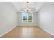 Dining area with tile flooring and stylish chandelier at 2745 Shearwater St, Clermont, FL 34711