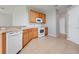 Functional kitchen featuring white appliances and ample counter space at 2745 Shearwater St, Clermont, FL 34711