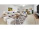 Spacious living room, including pool table, with stylish furnishings at 2745 Shearwater St, Clermont, FL 34711