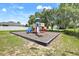 Community playground featuring colorful slides, climbing structures, and a cushioned ground cover at 2745 Shearwater St, Clermont, FL 34711