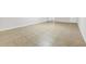 Large format neutral tile flooring throughout the space at 2745 Shearwater St, Clermont, FL 34711