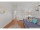 Bedroom showing hardwood floors, good natural light, and a closet at 2987 Kramer Ct, The Villages, FL 32163