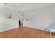 Spacious bedroom featuring hard wood flooring, a ceiling fan and natural light at 2987 Kramer Ct, The Villages, FL 32163