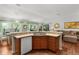 Kitchen with a breakfast bar, ample storage, and an open layout to the living room at 2987 Kramer Ct, The Villages, FL 32163