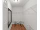 Bright walk-in closet with wood floors and white wire shelving at 2987 Kramer Ct, The Villages, FL 32163