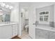 Spacious bathroom boasts double vanity, soaking tub, and a separate toilet room at 33943 E Lake Joanna Dr, Eustis, FL 32736