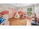 Bright ' bedroom featuring fun decor, built-in storage, and ample natural light at 33943 E Lake Joanna Dr, Eustis, FL 32736