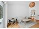Cozy play area featuring a small table, chairs, and natural light from a sliding glass door at 33943 E Lake Joanna Dr, Eustis, FL 32736