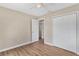 Bedroom with new floors, closet, and ceiling fan at 4 Kristin Ln, Eustis, FL 32726