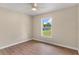 Bedroom with new floor and ceiling fan, with a great view at 4 Kristin Ln, Eustis, FL 32726