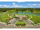 Community amenities including a pool, playground, recreational field, and water feature at 424 Noble Ave, Davenport, FL 33837