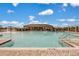 Resort-style community pool with splashpad feature and covered pavilion area, perfect for relaxation at 424 Noble Ave, Davenport, FL 33837
