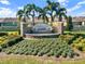Welcome to Charles Cove, featuring a beautiful water feature and lush landscaping at 424 Noble Ave, Davenport, FL 33837
