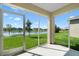 Enclosed patio with a beautiful view of the lake and surrounding neighborhood at 424 Noble Ave, Davenport, FL 33837