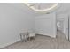 Bedroom showcases wood floors and a double door closet near entry to hallway at 4346 Pezzullo Cir, The Villages, FL 32163
