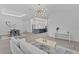 Spacious living area showcases the open floor plan with dining, kitchen, and living room at 4346 Pezzullo Cir, The Villages, FL 32163