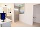 Contemporary bathroom featuring a glass-enclosed shower, sleek vanity, and neutral color palette at 6301 Danielson Loop, The Villages, FL 32163