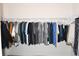 Walk-in closet with organized storage and ample hanging space for clothing and accessories at 6301 Danielson Loop, The Villages, FL 32163