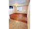 The living room features beautiful laminate flooring, natural light, and provides a comfortable space for relaxation at 679 Avenue Q Se, Winter Haven, FL 33880