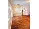 Spacious living room features beautiful laminate flooring, natural light, and provides a comfortable space at 679 Avenue Q Se, Winter Haven, FL 33880