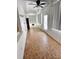 Sunroom with neutral tile flooring, lots of natural light, and offers a serene retreat for relaxation and enjoyment at 679 Avenue Q Se, Winter Haven, FL 33880