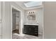 Well-lit bathroom with a modern vanity, framed mirror, and wood-look flooring at 780 N Kentucky Ave, Umatilla, FL 32784