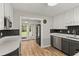 Kitchen features stainless steel appliances and French doors to the backyard at 780 N Kentucky Ave, Umatilla, FL 32784