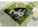 Aerial shot of the home showcasing the roof and landscaping at 800 Daybreak Dr, Fruitland Park, FL 34731
