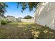Fenced backyard featuring green grass and some shade at 800 Daybreak Dr, Fruitland Park, FL 34731