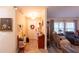 Welcoming entryway featuring decorative touches, warm colors, and tile flooring at 8489 Se 158Th Pl, Summerfield, FL 34491