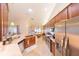Well-equipped kitchen featuring stainless steel appliances and granite countertops at 8489 Se 158Th Pl, Summerfield, FL 34491