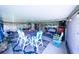 Inviting outdoor space featuring comfortable seating, dining area, and stylish decor at 8489 Se 158Th Pl, Summerfield, FL 34491