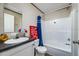 Cozy bathroom featuring a tub-shower combo and a decorated vanity at 892 Se 124Th Ave, Webster, FL 33597