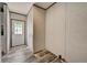 Entry hall with wood-look flooring and bright lighting at 892 Se 124Th Ave, Webster, FL 33597