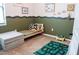 ' bedroom with a playful road-themed decor, a cozy bed, and a fun car rug, designed for comfort and imagination at 9219 Chandler Dr, Groveland, FL 34736