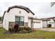 Beautiful single-Gathering home with a two-car garage, stone accents and lovely landscaping enhancing its curb appeal at 9219 Chandler Dr, Groveland, FL 34736