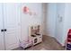 Playroom with a toy kitchen and play set, perfect for imaginative play and creating lasting memories at 9219 Chandler Dr, Groveland, FL 34736