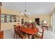 Dining area and living room with a view into the kitchen area for easy conversation at 9588 Se 124Th Loop, Summerfield, FL 34491