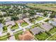This property sits in a charming neighborhood with lush greenery and well-maintained lawns at 965 Dartmouth Ave, Clermont, FL 34711