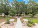 Enjoy the outdoors with a walking path that leads to a picnic area and covered gazebo at 965 Dartmouth Ave, Clermont, FL 34711