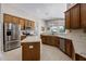 Bright kitchen with stainless steel appliances, center island, and stylish countertops at 965 Dartmouth Ave, Clermont, FL 34711
