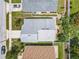An aerial view of a home with lush backyard landscaping at 1034 Copenhagen Way, Winter Garden, FL 34787