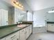 Bright bathroom showcasing a vanity with ample countertop space, and separate tub and shower at 1034 Copenhagen Way, Winter Garden, FL 34787