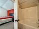 View of a shower and tub combination inside a bathroom at 1034 Copenhagen Way, Winter Garden, FL 34787