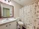 This bathroom features a vanity with a sink, a toilet, and a shower and tub combination at 1034 Copenhagen Way, Winter Garden, FL 34787