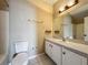 This bathroom features a vanity with a sink, and a tub and shower combination at 1034 Copenhagen Way, Winter Garden, FL 34787