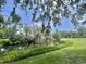 Community grounds with water view at 105 Avocado Cv, Leesburg, FL 34748