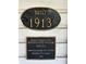 Image of a Historical marker indicating that the property was built in 1913, highlighting its historical significance at 110 S Trowell Ave, Umatilla, FL 32784